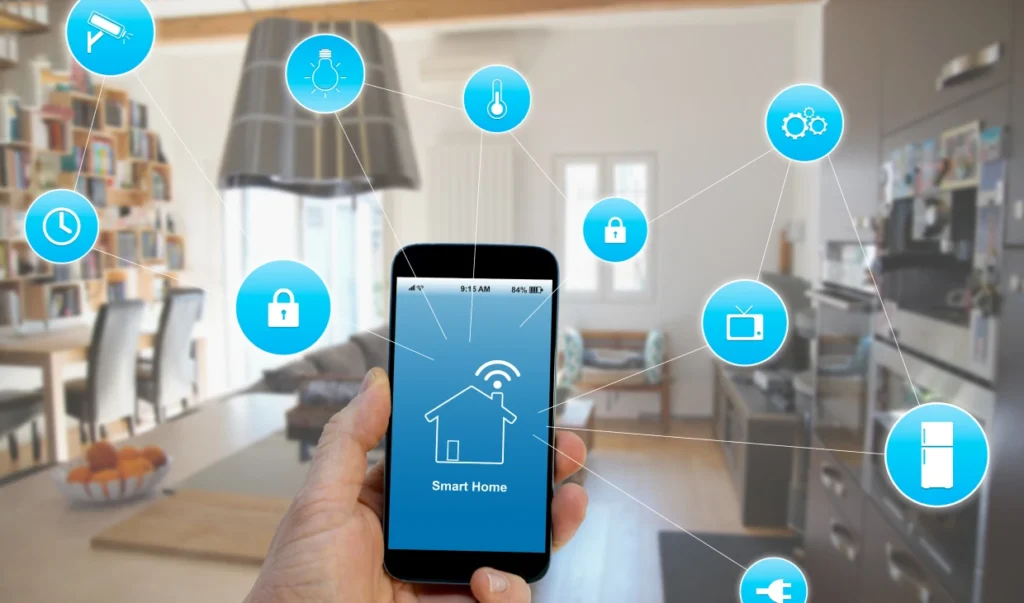 A hand holding a smartphone showcasing smart home automation controls