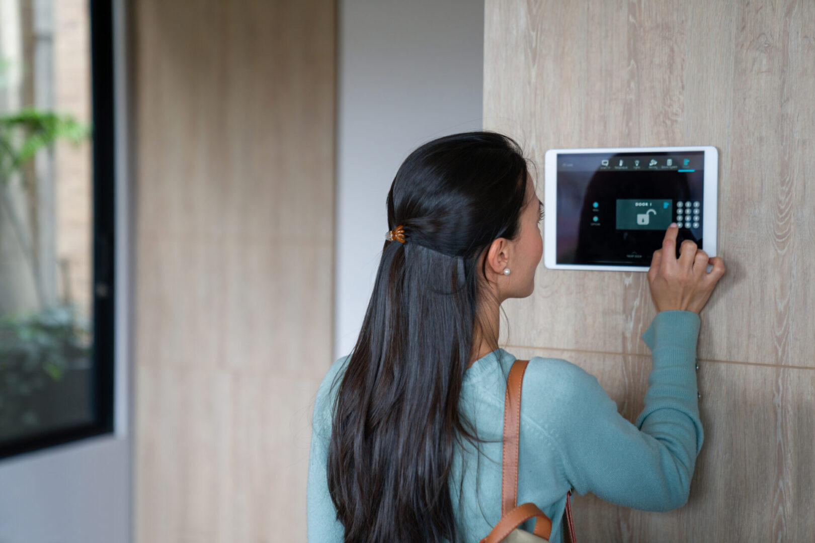 Person interacting with smart home device