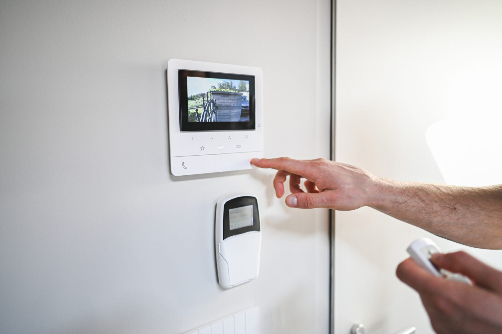 Touchscreen security monitor on wall