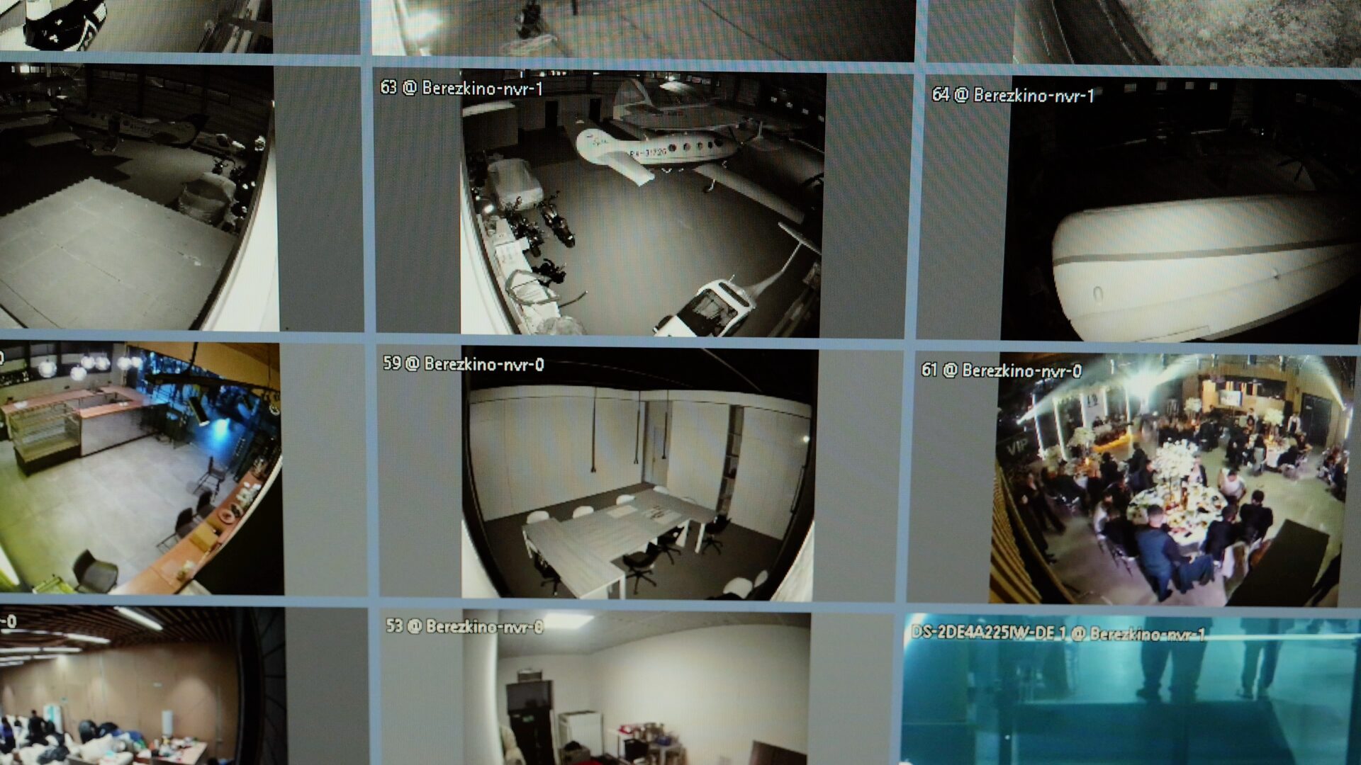 Surveillance camera feeds on multiple screens