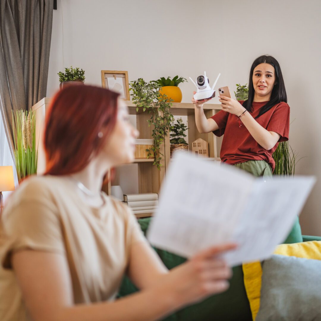 Woman explaining security camera setup