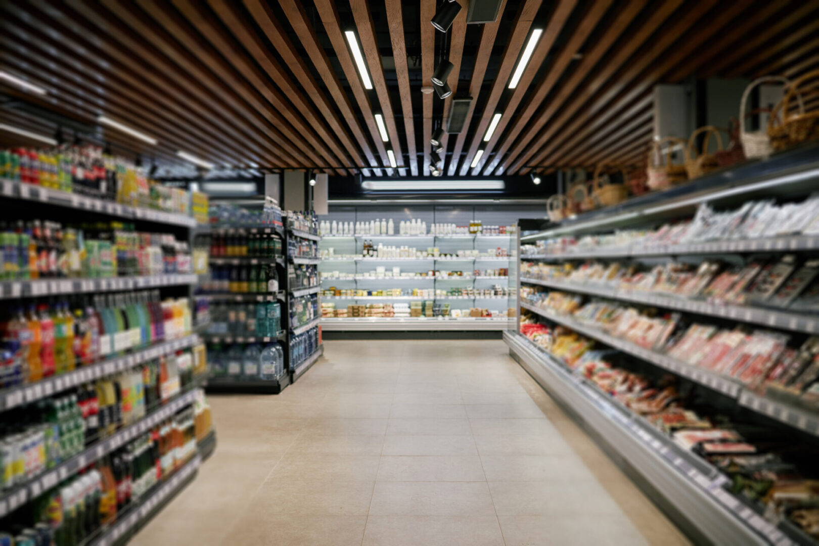 Grocery store aisle with stocked shelves
