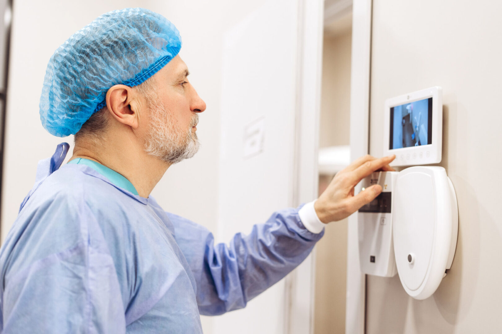 Surgeon checking screen in hospital
