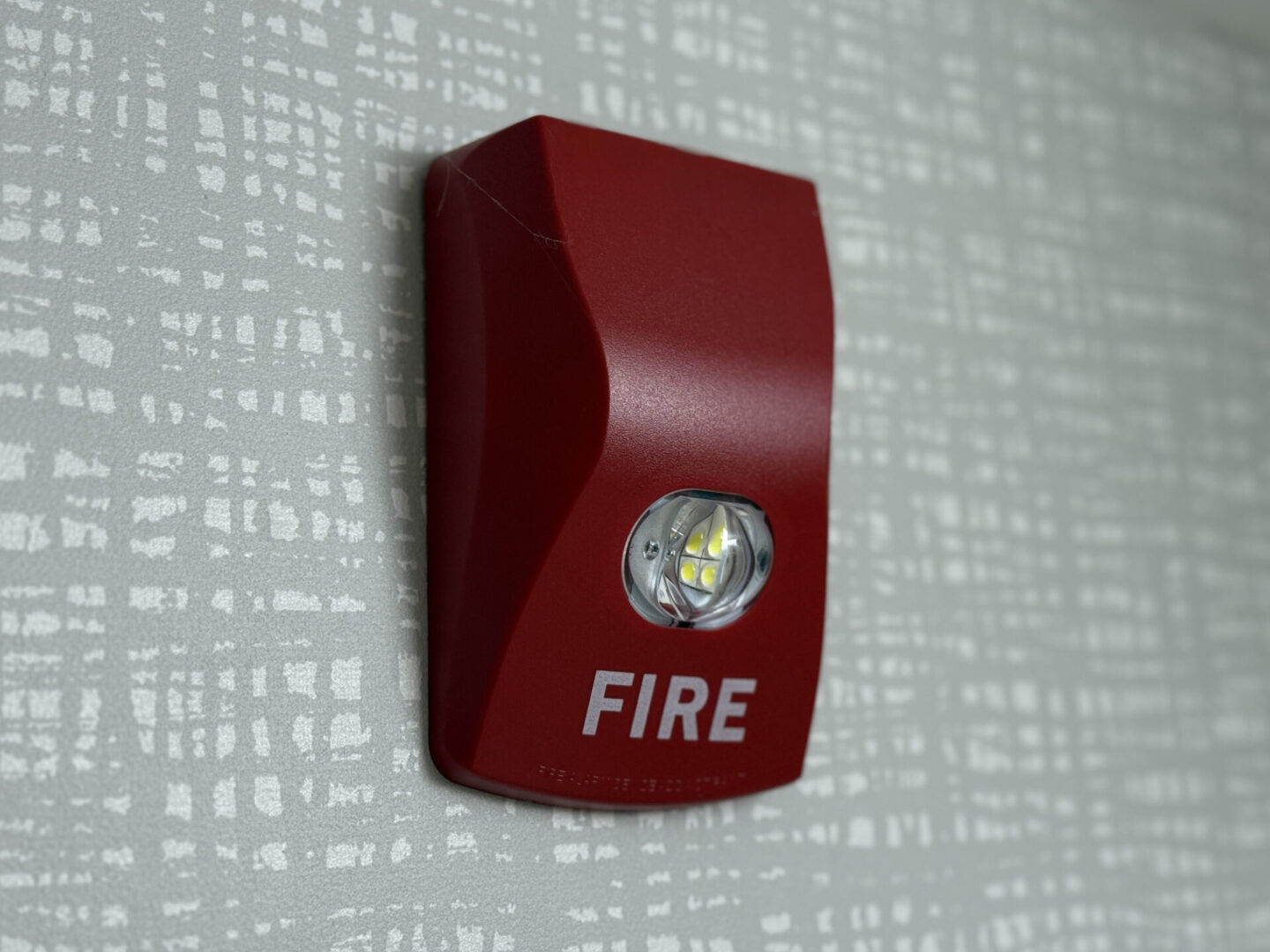 Emergency fire alarm with light