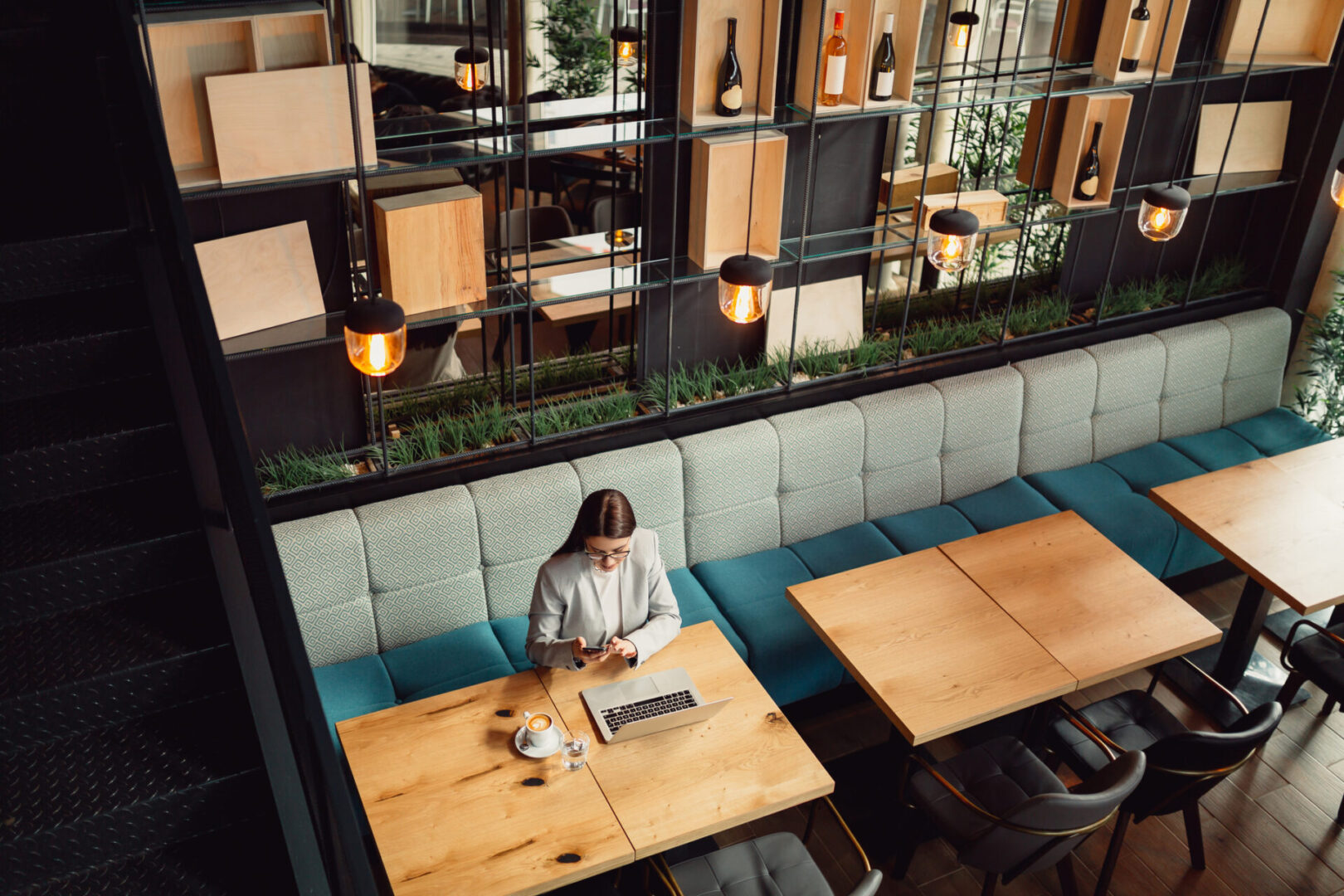 Woman working in a modern café